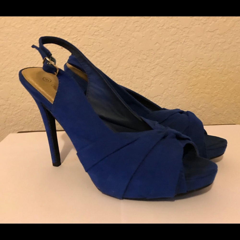Charming Charlie’s blue suede peep toe pump.